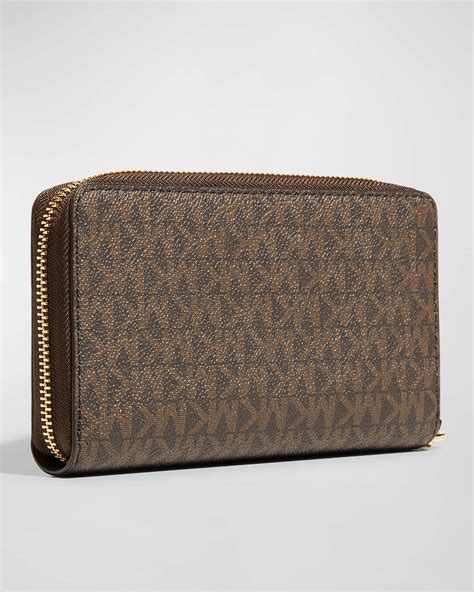 michael michael kors zip around snap wallet|Michael Kors zippered wallet.